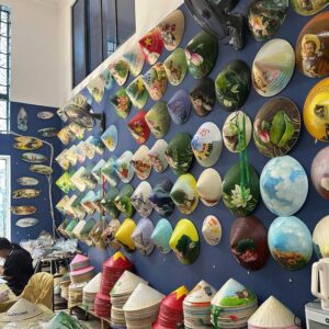 Custom conical hats in Vietnam for cultural gifts.