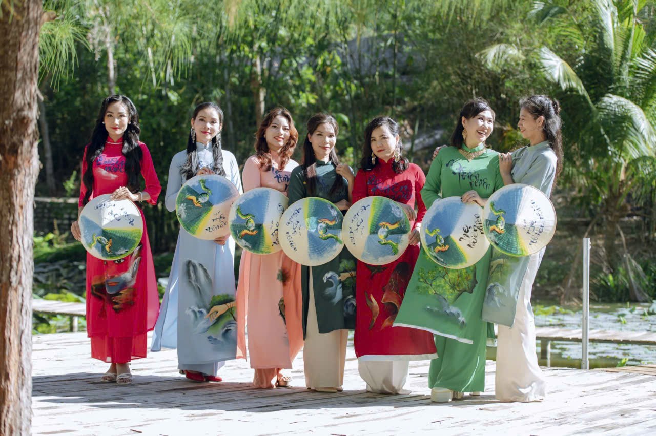Custom hand painted Ao Dai in Ho Chi Minh City