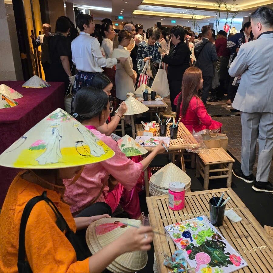 Personalized conical hat souvenir from Vietnam with hand-painted details
