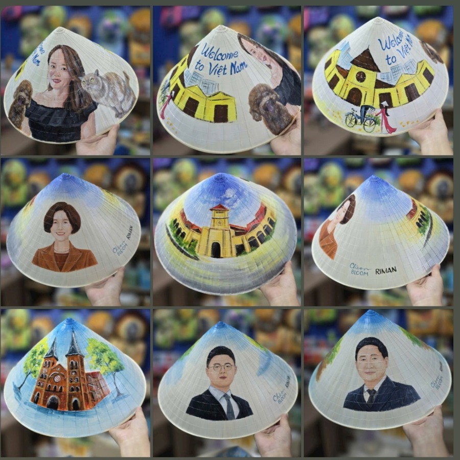 Hand-painted conical hats with custom portraits and Saigon landmarks such as Ben Thanh Market and Notre-Dame Cathedral
